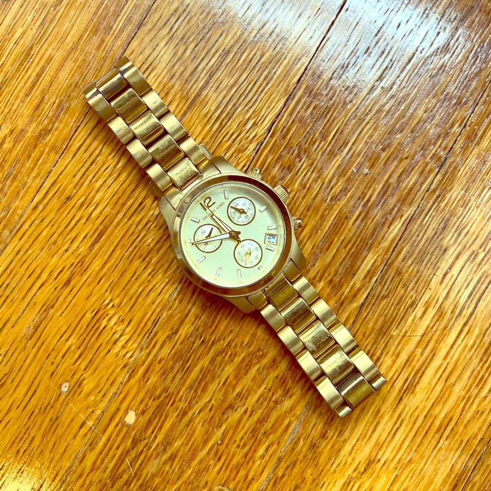 Michael Joe’s gold watch